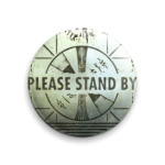 Please Stand By